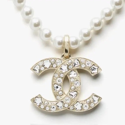 25P PEARL NECKLACE IN LIGHT GOLD STAR & HEART DOUBLE C PENDANT