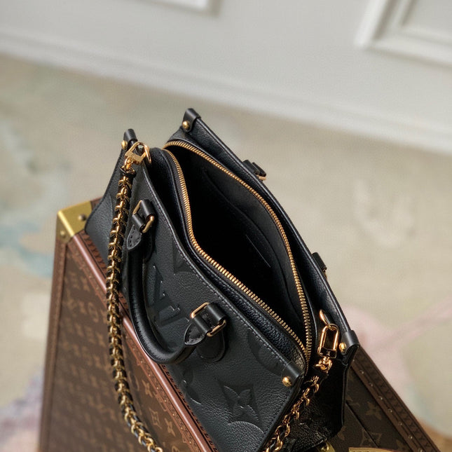 ONTHEGO EAST WEST BAG 25 IN BLACK MONOGRAM EMBOSSED COWHIDE