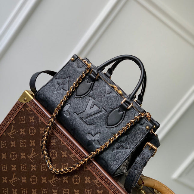 ONTHEGO EAST WEST BAG 25 IN BLACK MONOGRAM EMBOSSED COWHIDE