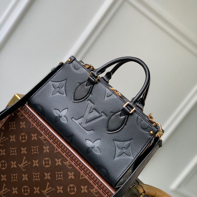 ONTHEGO EAST WEST BAG 25 IN BLACK MONOGRAM EMBOSSED COWHIDE