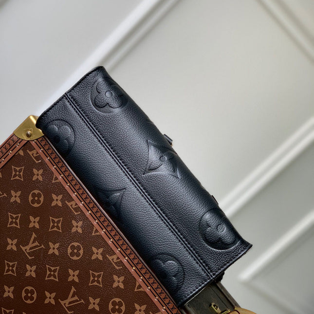 ONTHEGO EAST WEST BAG 25 IN BLACK MONOGRAM EMBOSSED COWHIDE