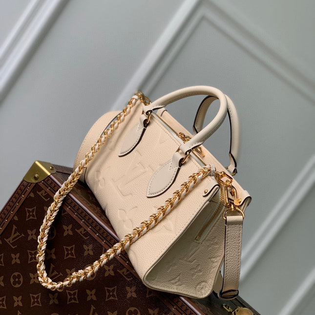 ONTHEGO EAST WEST BAG 25 IN BEIGE MONOGRAM EMBOSSED COWHIDE