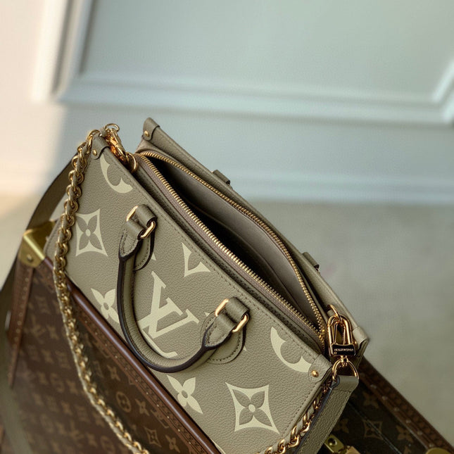 ONTHEGO EAST WEST BAG 25 IN GREEN MONOGRAM EMBOSSED COWHIDE