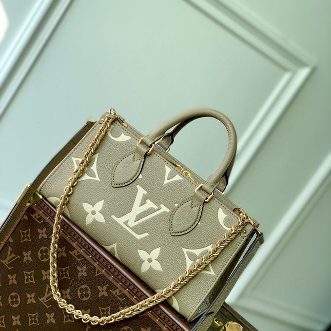 ONTHEGO EAST WEST BAG 25 IN GREEN MONOGRAM EMBOSSED COWHIDE