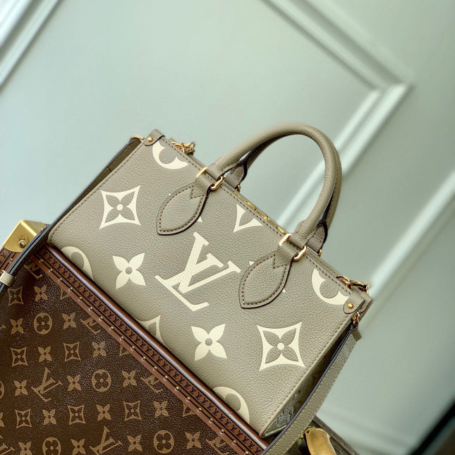 ONTHEGO EAST WEST BAG 25 IN GREEN MONOGRAM EMBOSSED COWHIDE