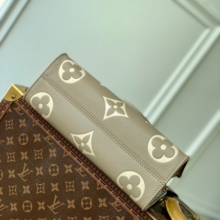 ONTHEGO EAST WEST BAG 25 IN GREEN MONOGRAM EMBOSSED COWHIDE