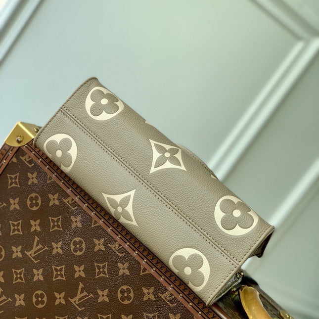 ONTHEGO EAST WEST BAG 25 IN GREEN MONOGRAM EMBOSSED COWHIDE