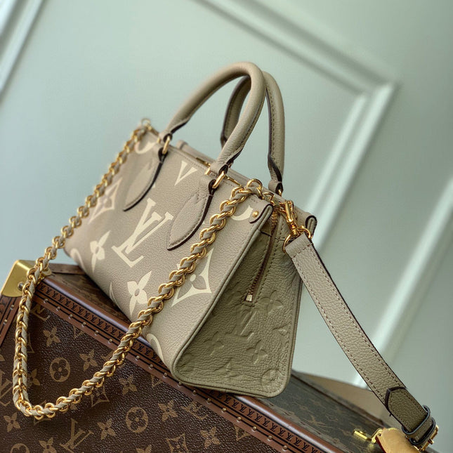 ONTHEGO EAST WEST BAG 25 IN GREEN MONOGRAM EMBOSSED COWHIDE