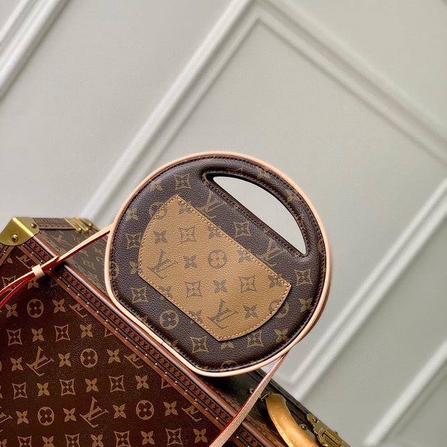 AROUND ME PM 22 IN BROWN MONOGRAM CANVAS