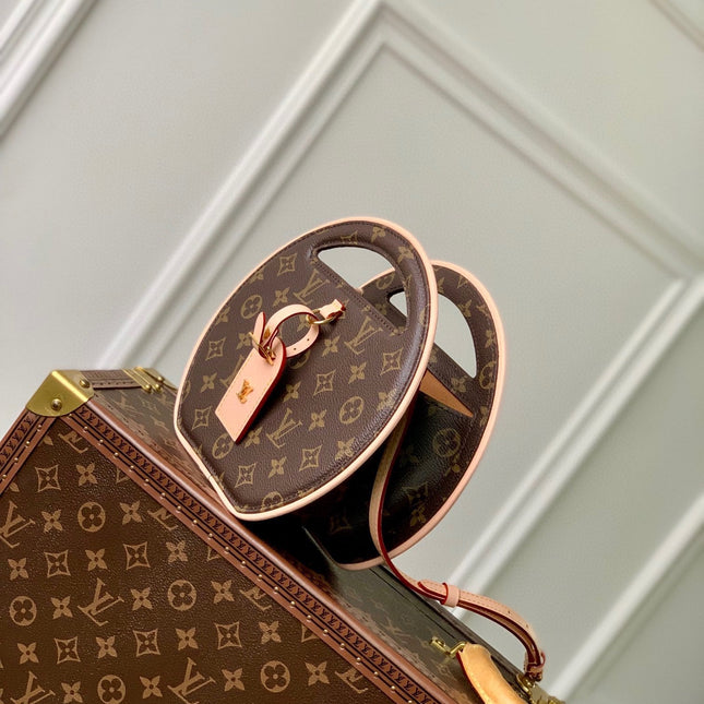 AROUND ME PM 22 IN BROWN MONOGRAM CANVAS
