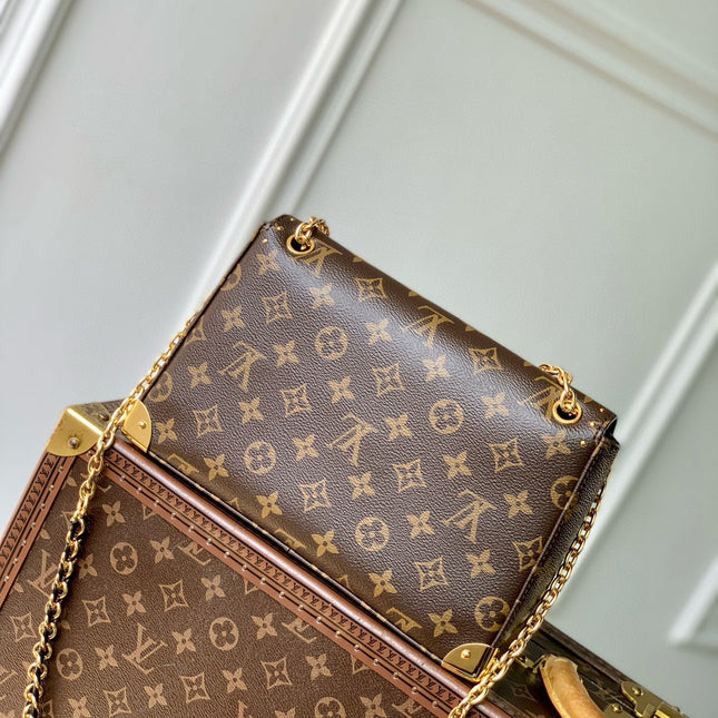 TRUNKIE 27 IN BROWN COATED CANVAS BLACK CALFSKIN SIGNATURE S-LOCK