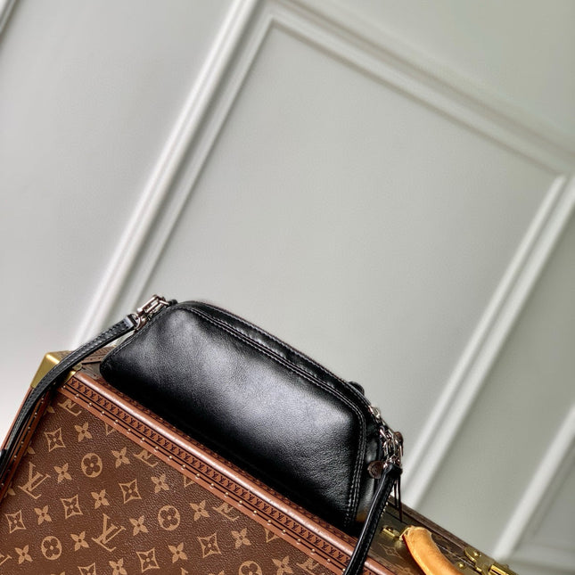 POCHETTE VIBE HANDBAG 25 IN BLACK LAMBSKIN BROWN COWHIDE AND COATED CANVAS TRIM