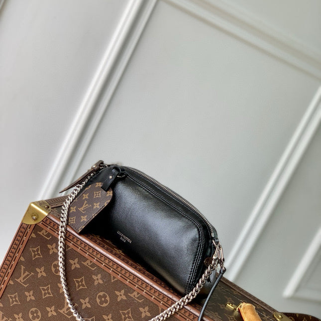 POCHETTE VIBE HANDBAG 25 IN BLACK LAMBSKIN BROWN COWHIDE AND COATED CANVAS TRIM