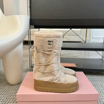 SNOW LONG BOOTS IN COSMIC LATTE SHEARLING