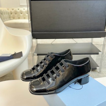 LACE-UP HIGH SHOES IN BLACK GLOSSY CALFSKIN