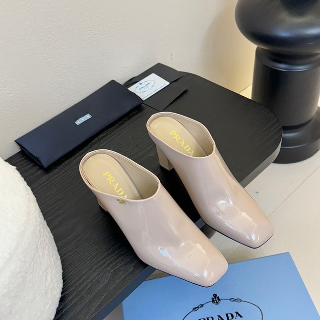 HIGH HEEL MULES WITH GOLD LETTERING LOGO IN BEIGE GLOSSY CALFSKIN