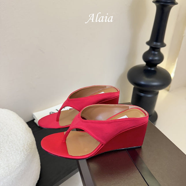 ALAIA WEDGE THONG SANDALS 25S IN RED SATIN