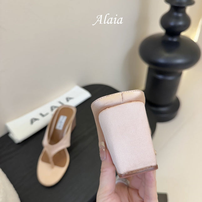 ALAIA WEDGE THONG SANDALS 25S IN BLUSH BEIGE SATIN