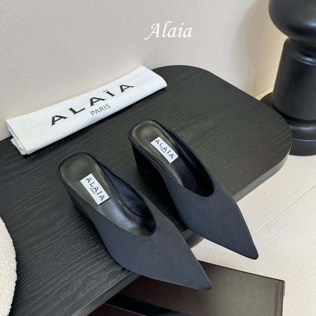ALAIA HIGH MULES 25S IN BLACK SATIN