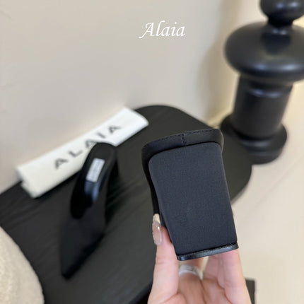 ALAIA HIGH MULES 25S IN BLACK SATIN