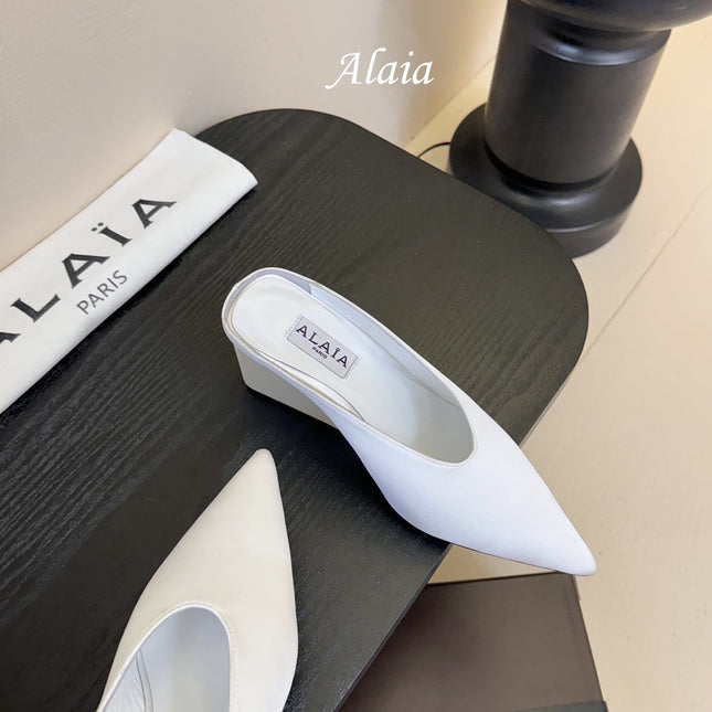 ALAIA HIGH MULES 25S IN WHITE SATIN
