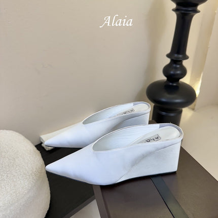 ALAIA HIGH MULES 25S IN WHITE SATIN