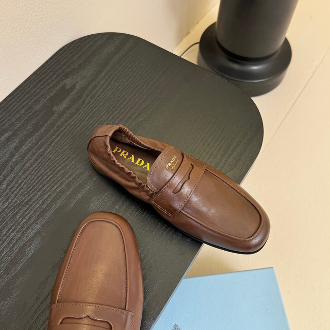PRADA 25S SHUFFLE LOAFERS IN EARTH BROWN CALFSKIN