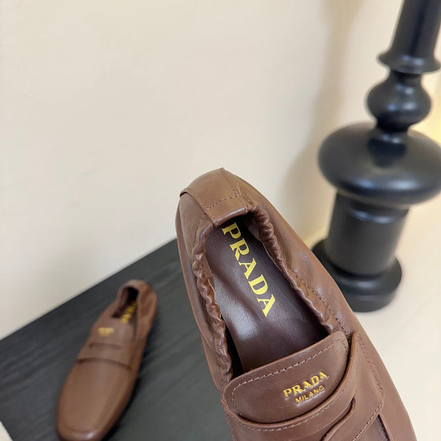 PRADA 25S SHUFFLE LOAFERS IN EARTH BROWN CALFSKIN