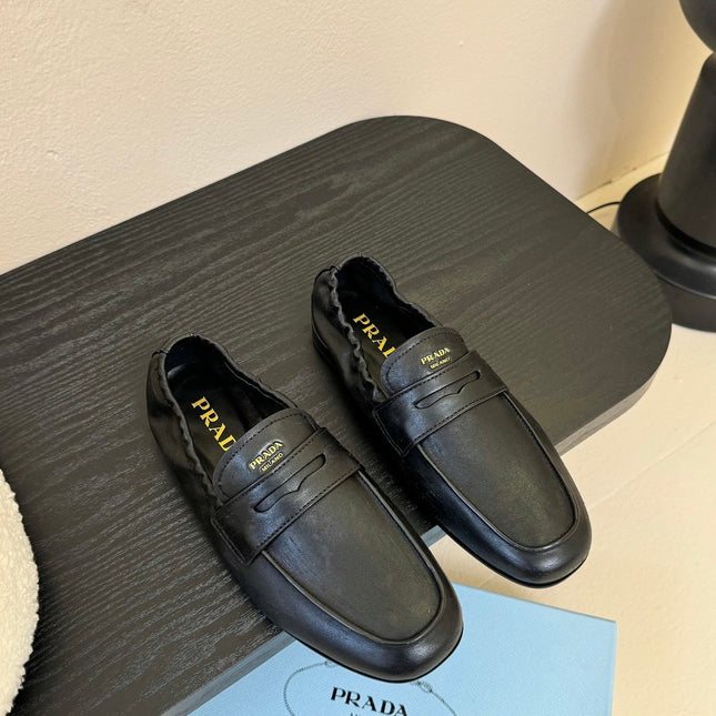 PRADA 25S SHUFFLE LOAFERS IN BLACK CALFSKIN