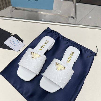 PRA SAFFIANO PATENT SLIDES OSTRICH MOTIF WHITE CALFSKIN
