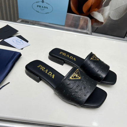 PRA SAFFIANO PATENT SLIDES OSTRICH MOTIF BLACK CALFSKIN