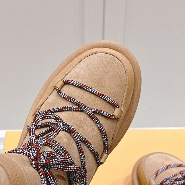 ASPEN PLATFORM ANKLE BOOT IN CIDER BROWN MONOGRAM DEBOSSED SUEDE AND SHEARLING