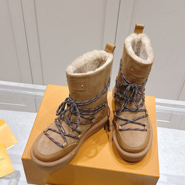 ASPEN PLATFORM ANKLE BOOT IN CIDER BROWN MONOGRAM DEBOSSED SUEDE AND SHEARLING