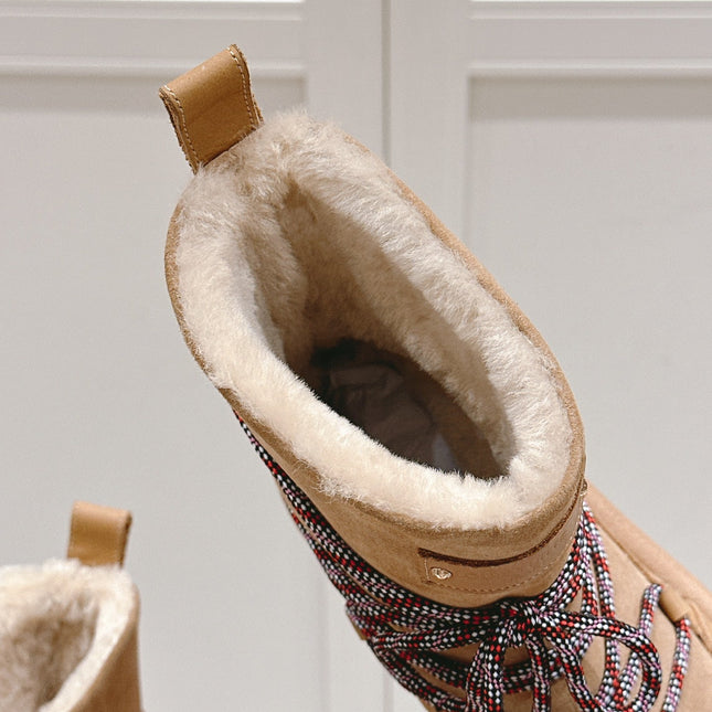 ASPEN PLATFORM ANKLE BOOT IN CIDER BROWN MONOGRAM DEBOSSED SUEDE AND SHEARLING