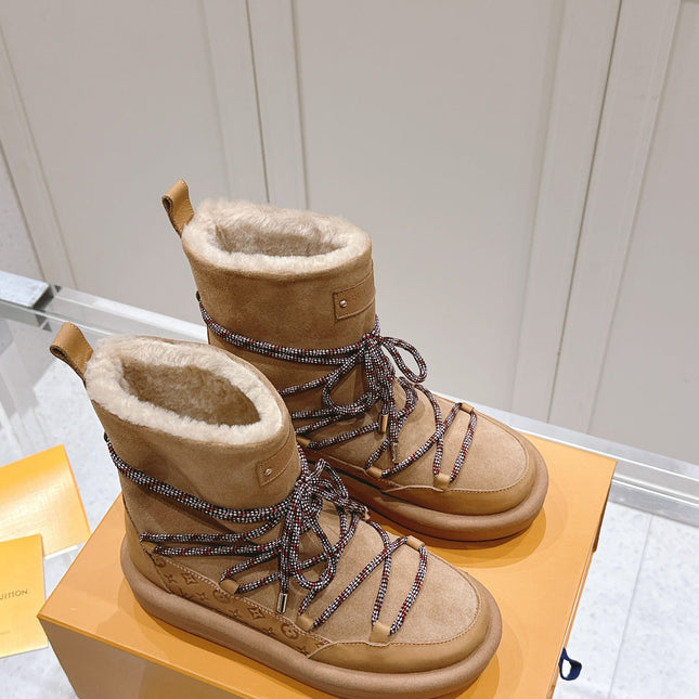 ASPEN PLATFORM ANKLE BOOT IN CIDER BROWN MONOGRAM DEBOSSED SUEDE AND SHEARLING