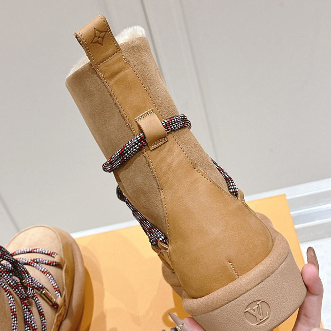 ASPEN PLATFORM ANKLE BOOT IN CIDER BROWN MONOGRAM DEBOSSED SUEDE AND SHEARLING