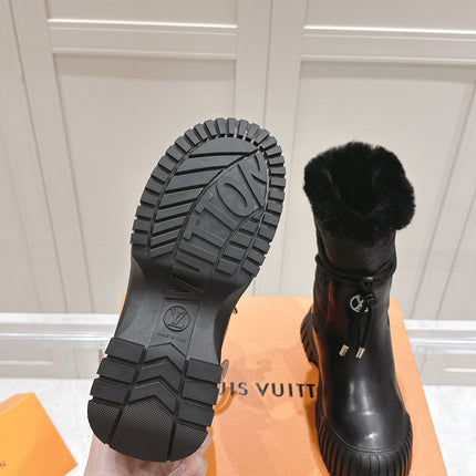 RUBY FLAT ANKLE BOOT IN BLACK CALFSKIN AND MONOGRAM NYLON
