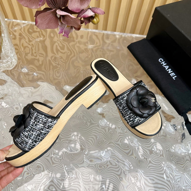 PLATFORM SLIPPERS WITH FLOWER IN BLACK LAMBSKIN
