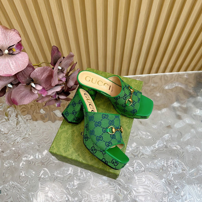 HORSEBIT SLIDE SANDAL IN FOREST GREEN MONOGRAM CANVAS AND SHEEPSKIN LINING