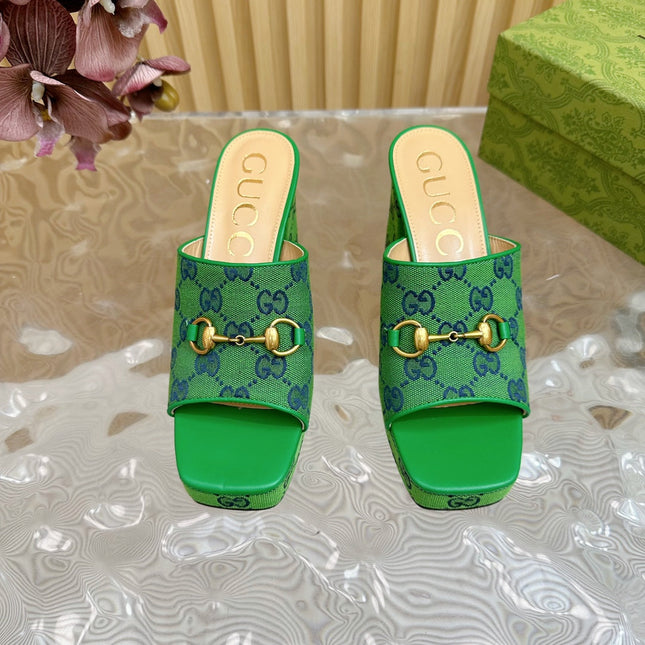 HORSEBIT SLIDE SANDAL IN FOREST GREEN MONOGRAM CANVAS AND SHEEPSKIN LINING