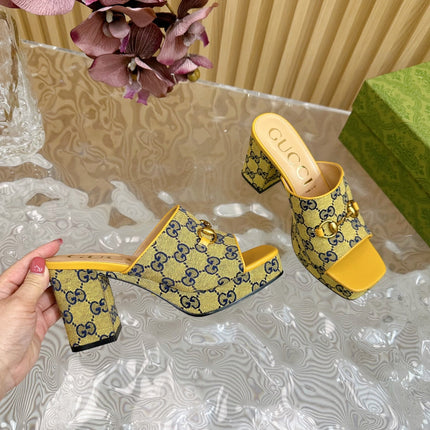HORSEBIT SLIDE SANDAL IN TUSCANY YELLOW MONOGRAM CANVAS AND SHEEPSKIN LINING