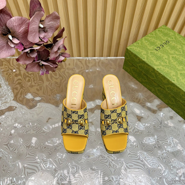 HORSEBIT SLIDE SANDAL IN TUSCANY YELLOW MONOGRAM CANVAS AND SHEEPSKIN LINING