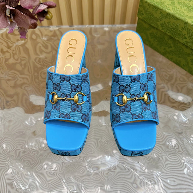 HORSEBIT SLIDE SANDAL IN AZURE BLUE MONOGRAM CANVAS AND SHEEPSKIN LINING