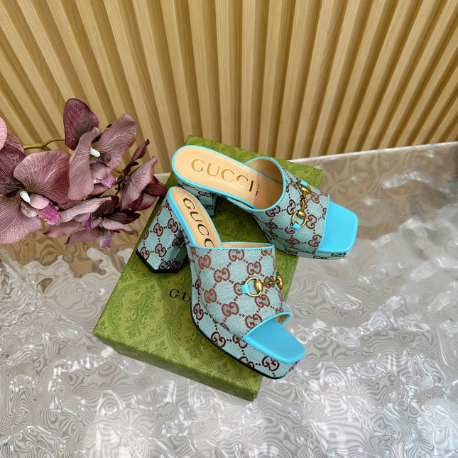 HORSEBIT SLIDE SANDAL IN SKY BLUE MONOGRAM CANVAS AND SHEEPSKIN LINING
