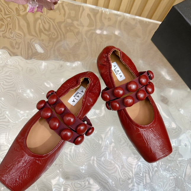 ALAIA MARY JANE PEARL IN GLOSSY MARS RED LAMBSKIN