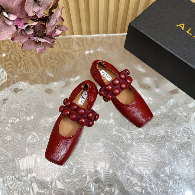 ALAIA MARY JANE PEARL IN GLOSSY MARS RED LAMBSKIN