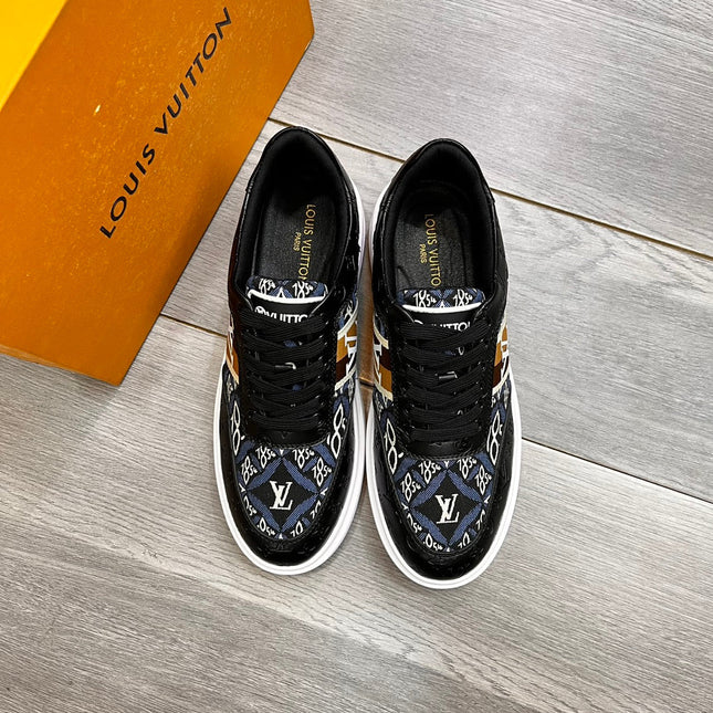 LV TRAINER IN BLACK EMBOSSED CALFSKIN AND MONOGRAM FABRIC