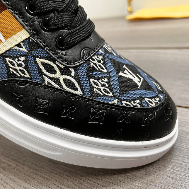 LV TRAINER IN BLACK EMBOSSED CALFSKIN AND MONOGRAM FABRIC