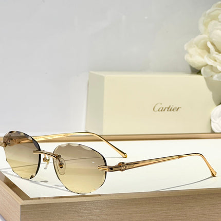 C DE RIMLESS ROUND FRAME SUNGLASSES CT0611S IN METAL