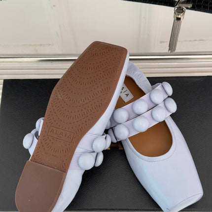 ALAIA MARY JANE PEARL IN PALE PURPLE GLOSSY LAMBSKIN